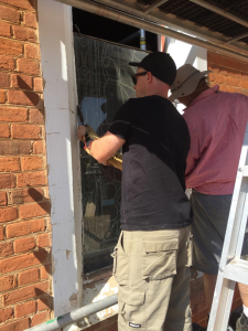 Hacking out putty to free overglazing